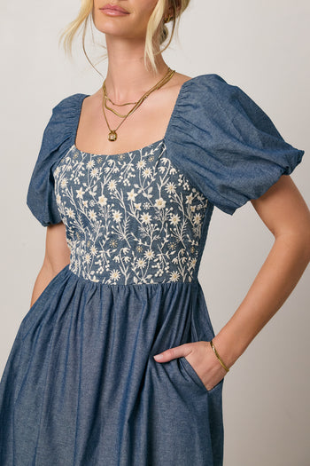 denim dress with embroidered floral detail