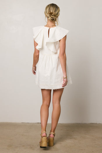 white dress with raw hem