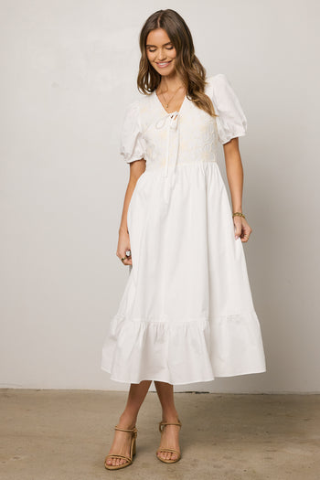 white dress with puff sleeves