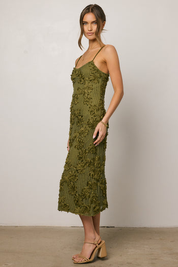 green dress with texture floral detail