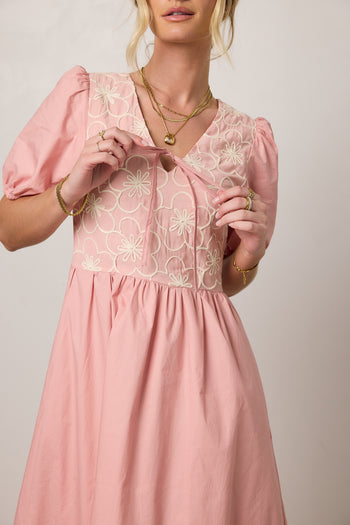 pink dress with floral embroidery