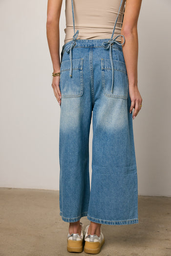 medium wash overalls