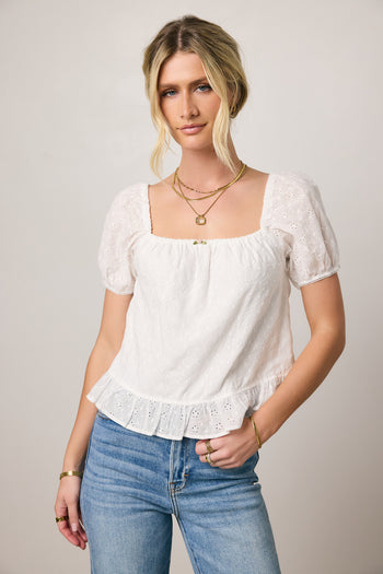 white blouse with eyelet detail