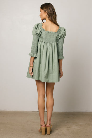 green mini dress with sleeves