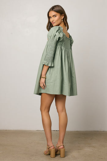 dress with smocked sleeves