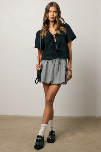 tie front closure on black blouse