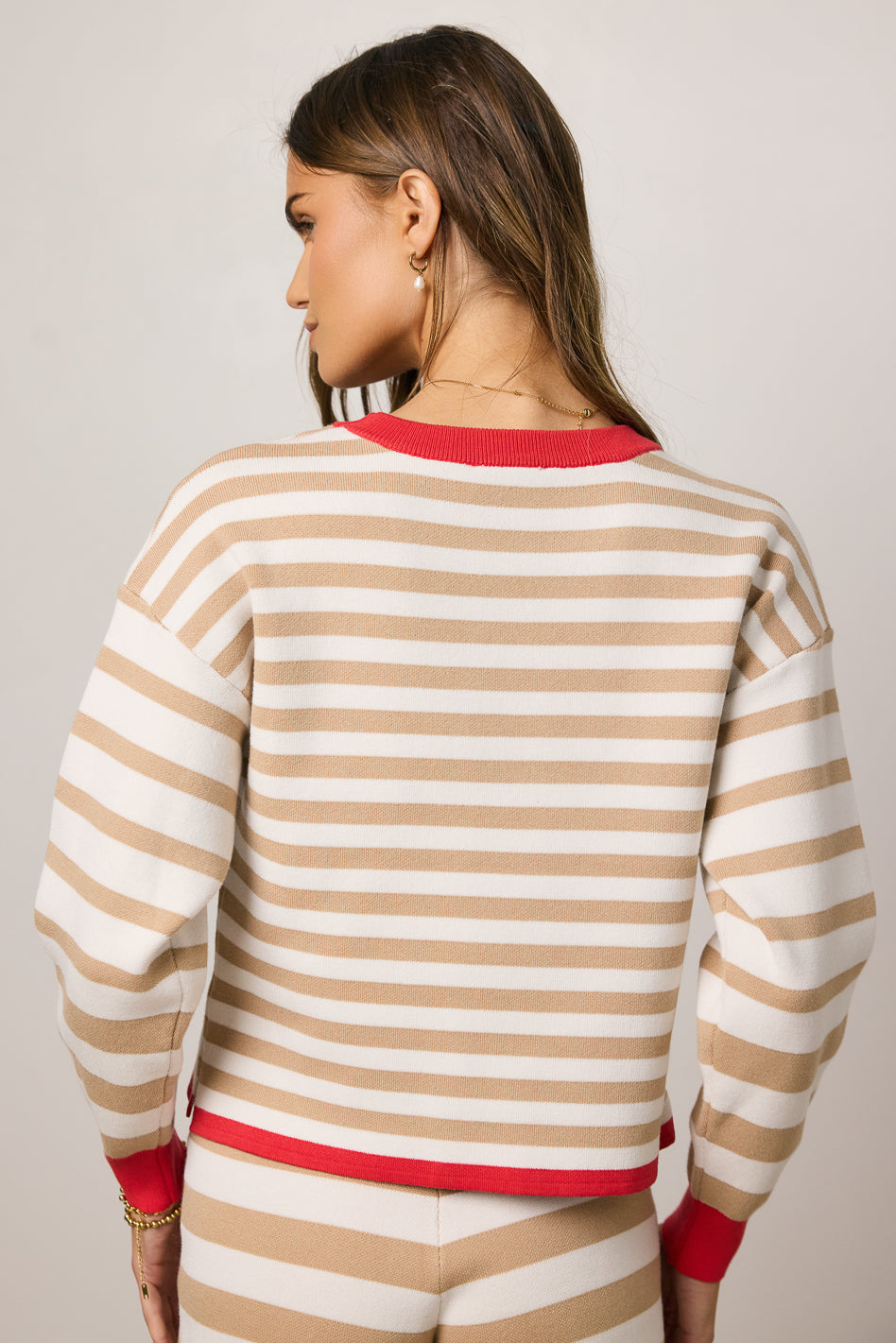 tan and white striped sweater
