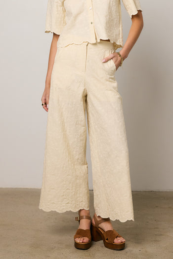 pants with scalloped hem