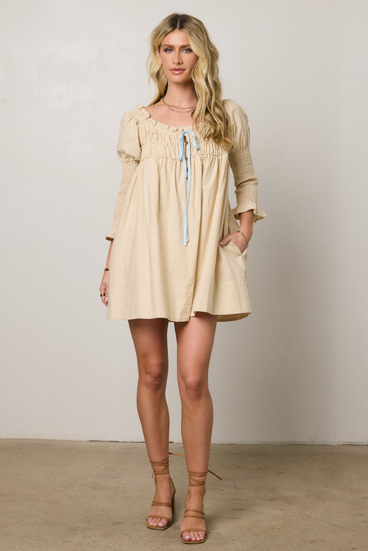 beige smocked dress