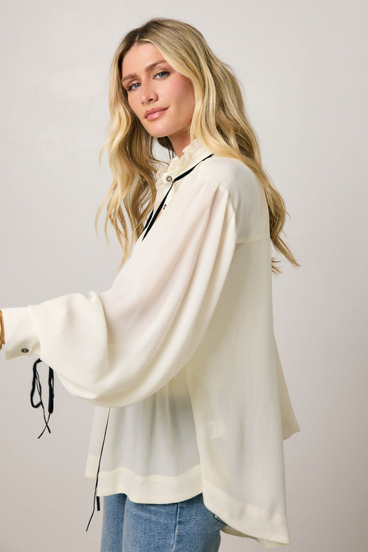 SHEER SHIRT WITHDETAL AT C THE CUFF OF SLEEV