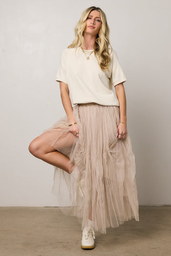 cream top with round neckline