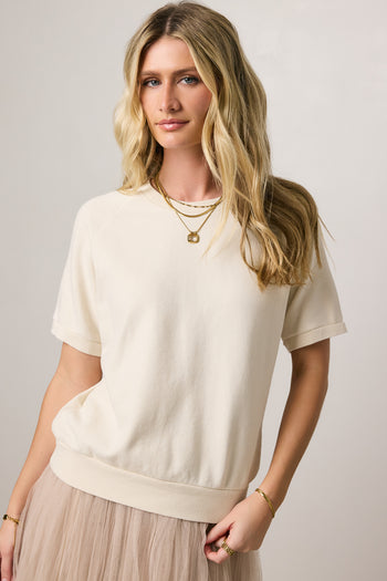 cream top with short sleeves
