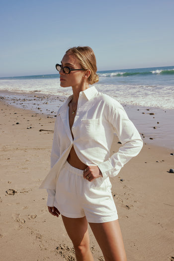 white shorts with matching button up
