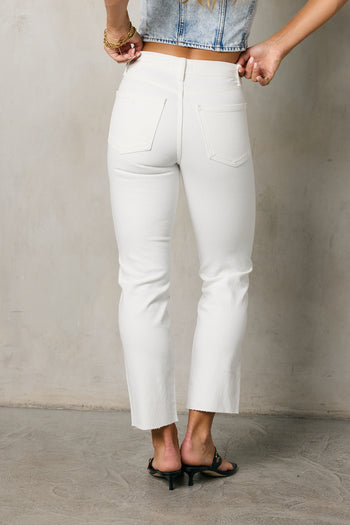 back pockets on white denim 