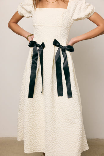 textured dress with bow ties