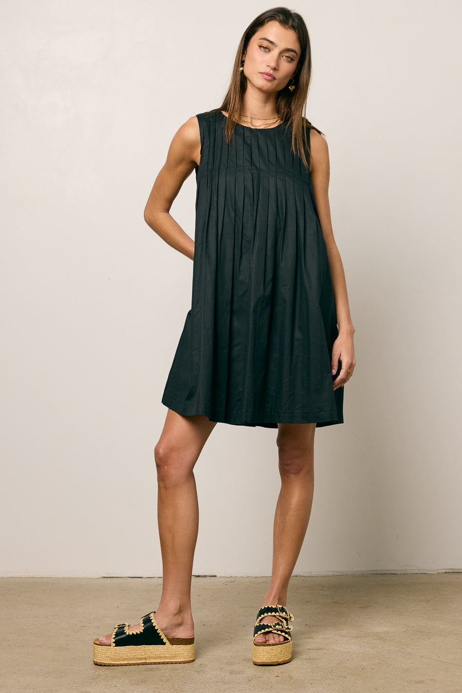 pleated mini dress in black