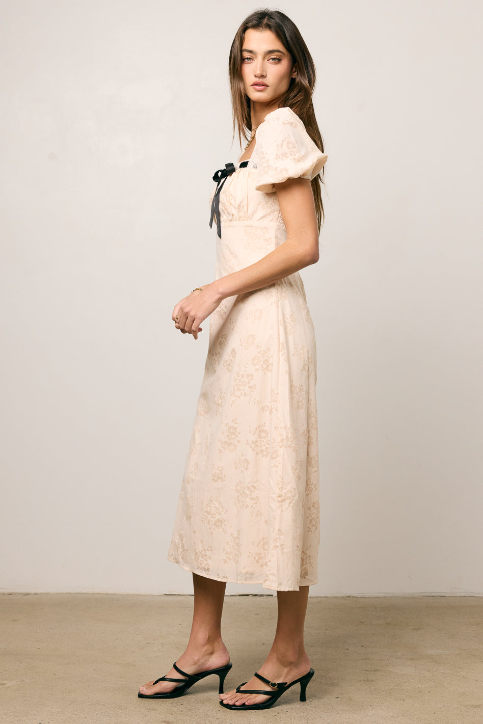 PRINTED CREAM MIDI DRESS WITH BLACK BOW TIE
