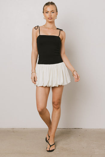 black dress with white skirt