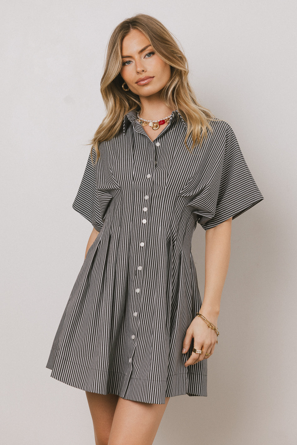 folds button elegant casual mini dress Short-sleeved mini dress with golden buttons :: LICHI