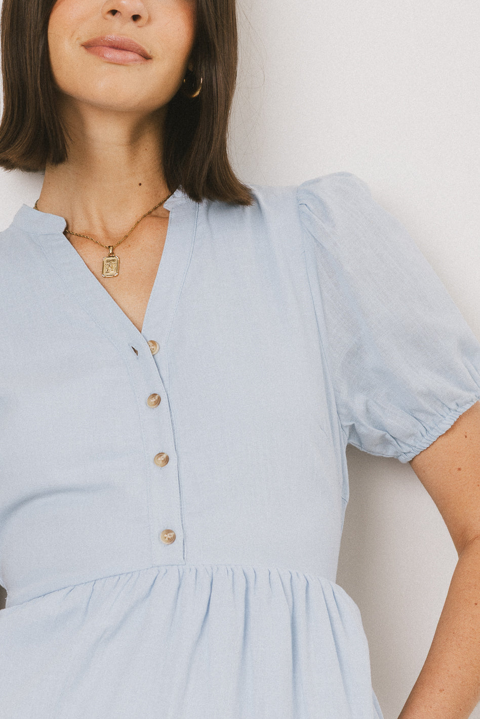 blue dress with buttons