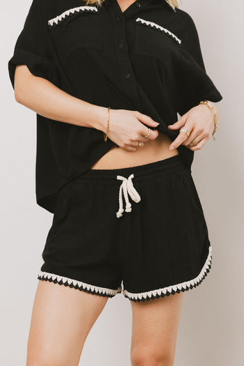 black embroidered shorts