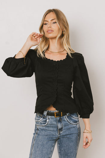 CUFFED SLEEVES ON BLACK DRESS