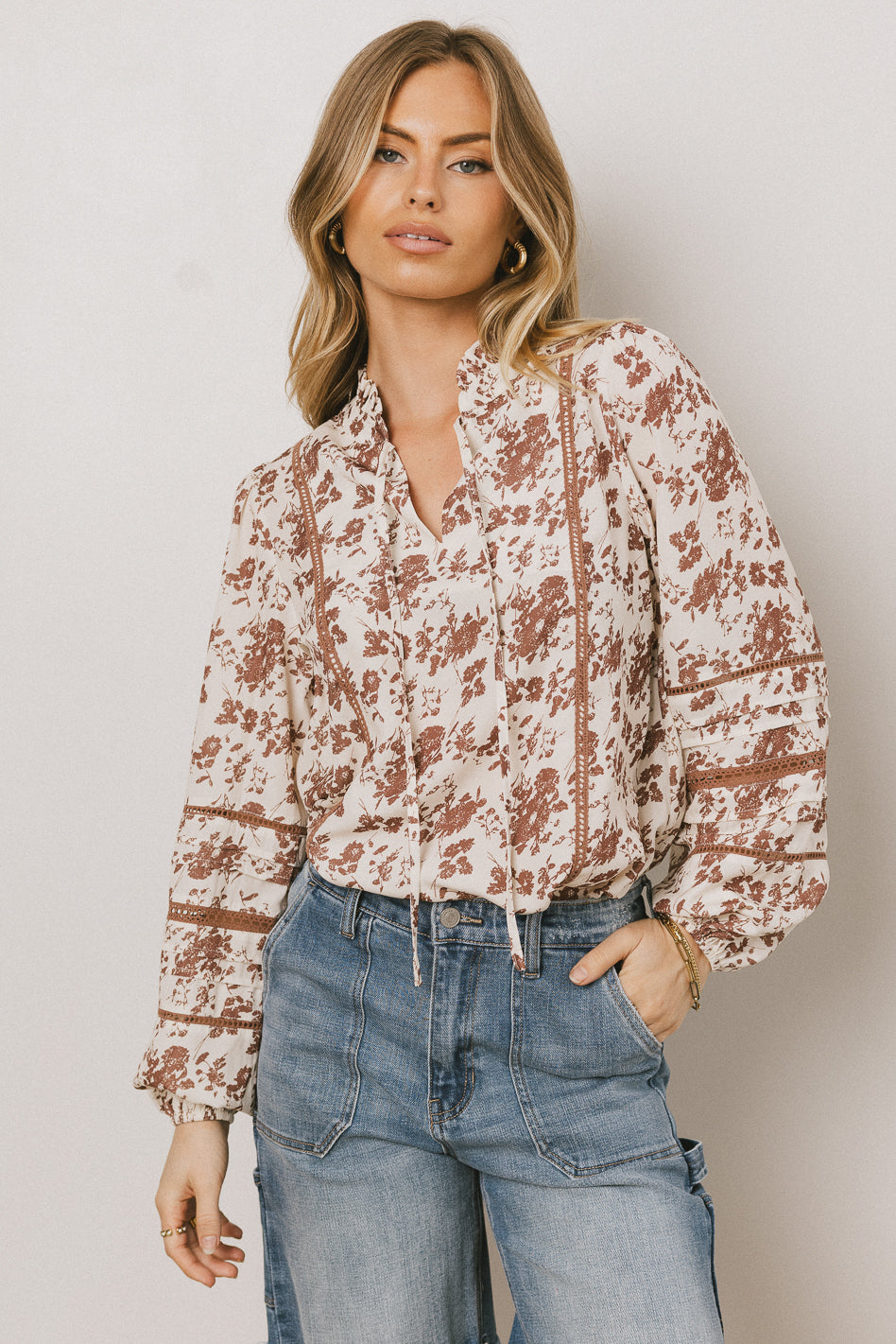 v neck on rust blouse 