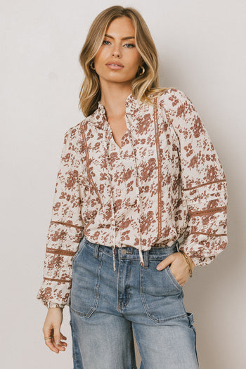 v neck on rust blouse 