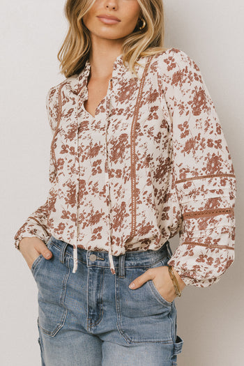 floral blouse in rust