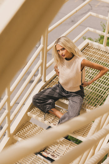 sleeveless knit sweater in cream