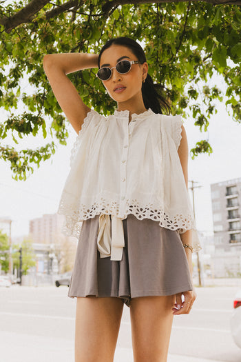 cream blouse with buttons