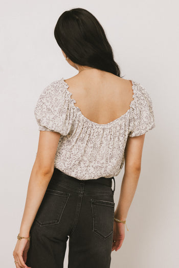 DEEP BACK ON PRINTED BLUSE 