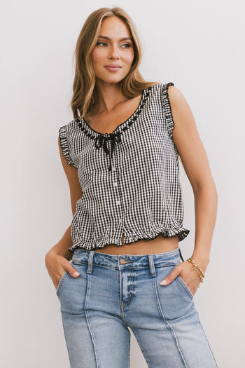 black top with ruffle detail