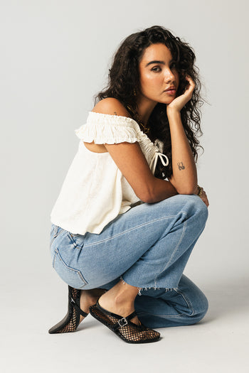 FRAYED HEMLINE JEANS