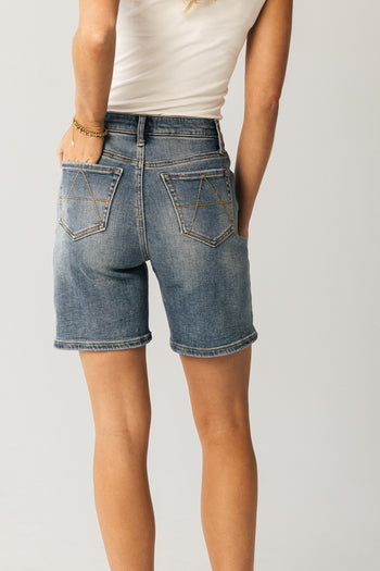 DISTRESSED WASHED DENIM JEANS