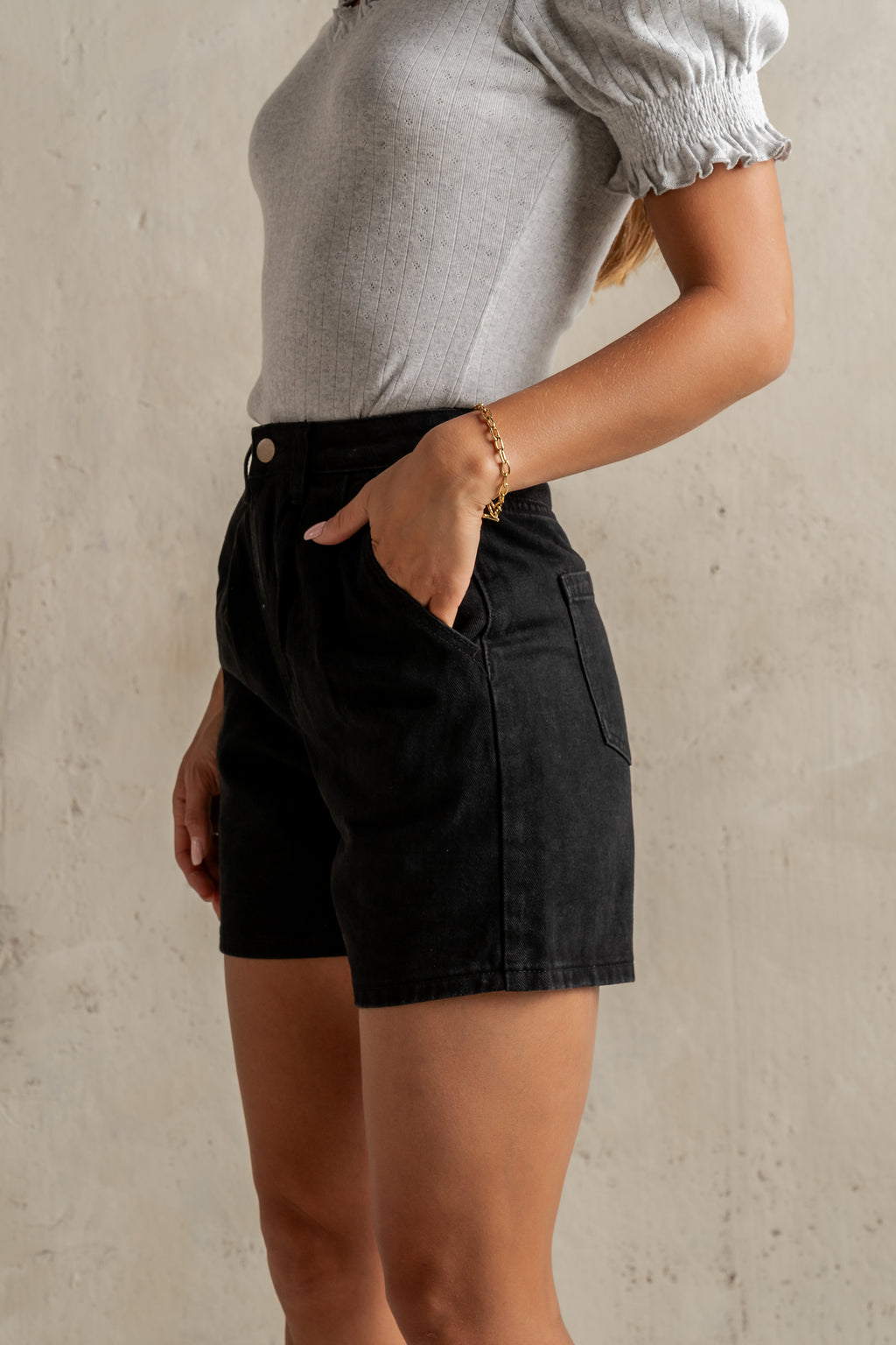 BLACK DENIM SHORTS WITH TWO SLANT HAND POCKETS AND BELT LOOPS