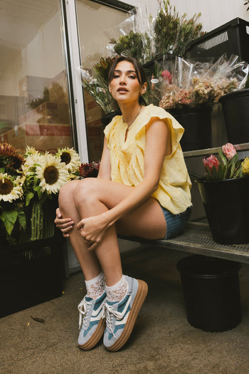 yellow short sleeve blouse 