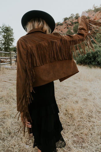  Fringe down the sleeve of jacket 