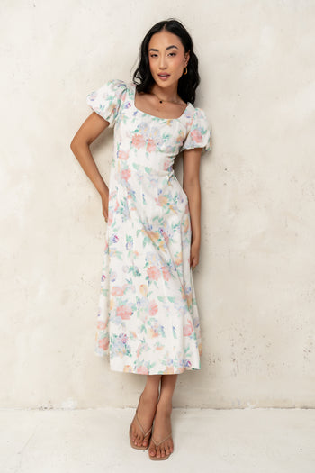 cream dress with floral print