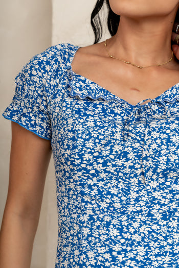 scalloped v-neck with small bow