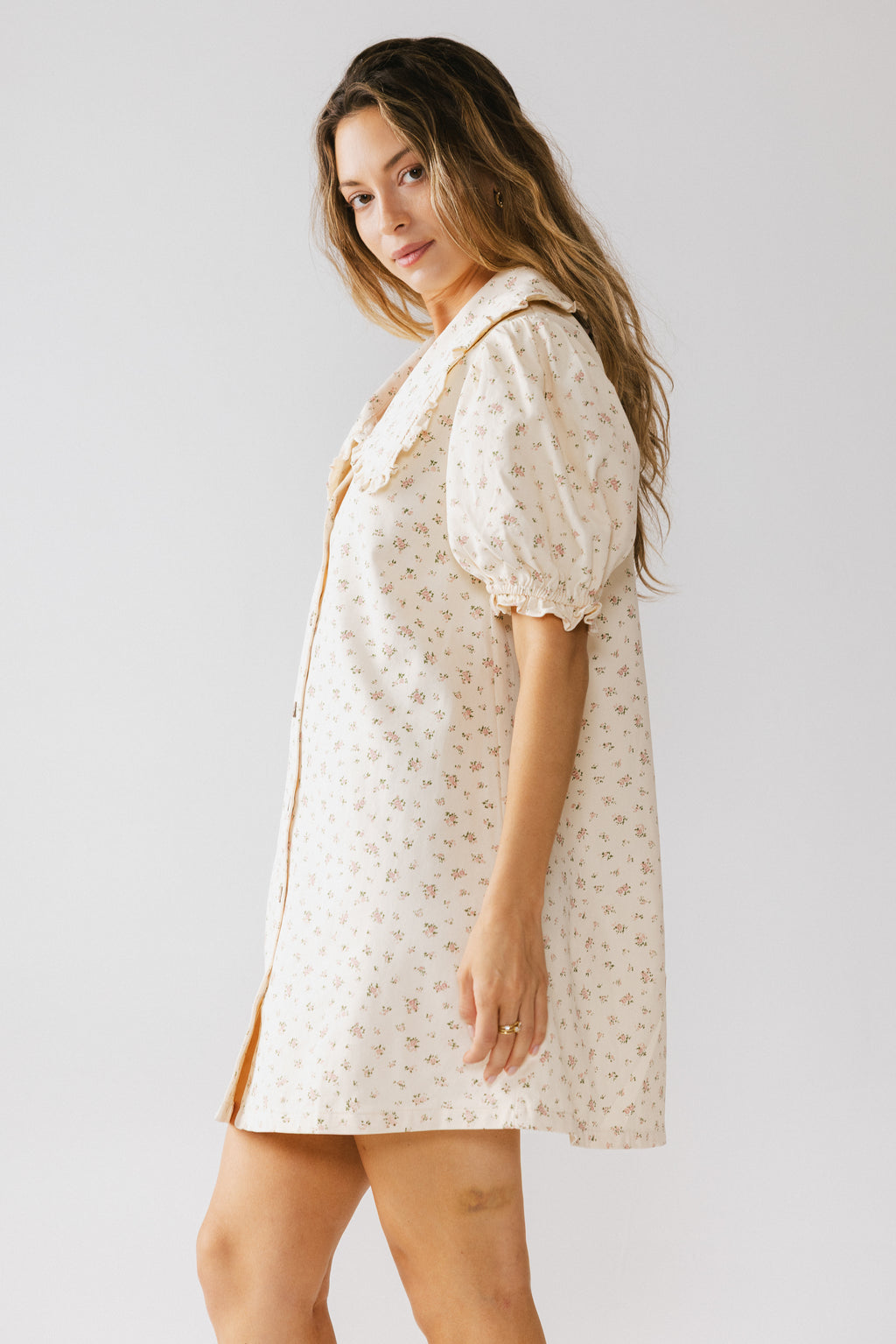 cuffed puff sleeves on floral midi dress 