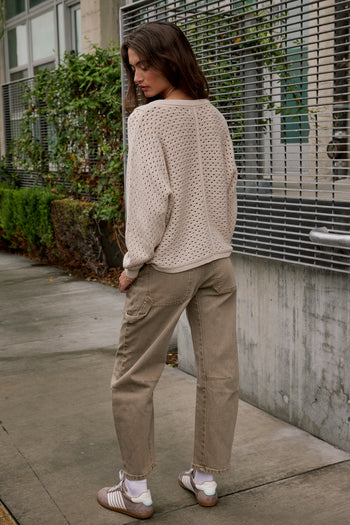BACK POCKETS ON TAN DENIM