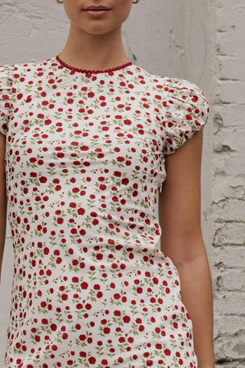 red floral print on white dress 