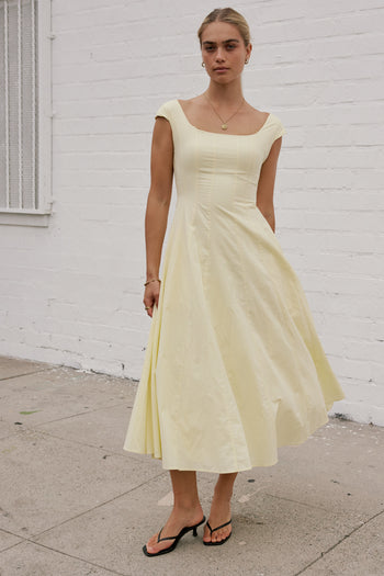 FITTED TOP WITH A FLOWY BOTTOM