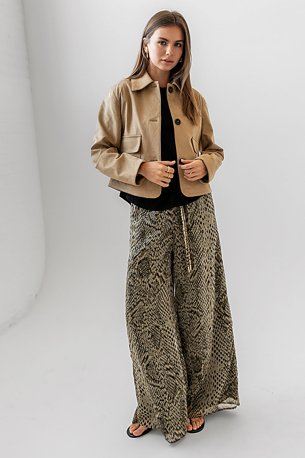baggy printed pants with suede jacket
