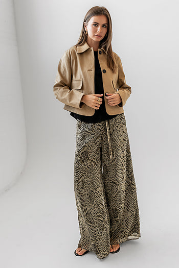 baggy printed pants with suede jacket