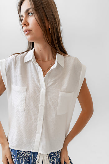 Sleeveless with a Front Button Closure