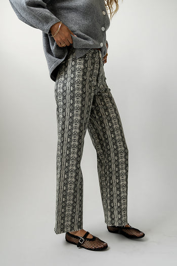 snake printed pants with raw hem