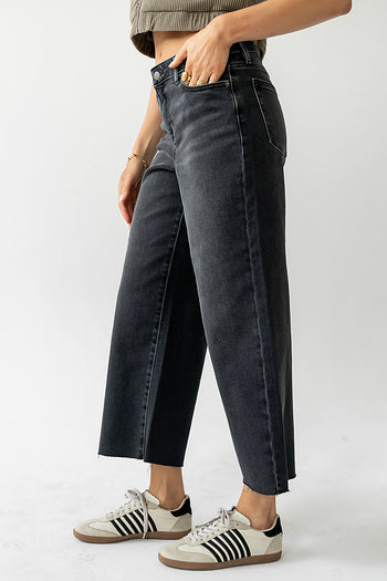 RAW HEMED Jeans in Faded Black