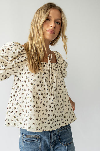 square neckline with a tiny bow